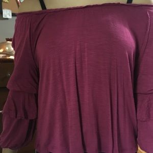 Off the shoulder shirt.